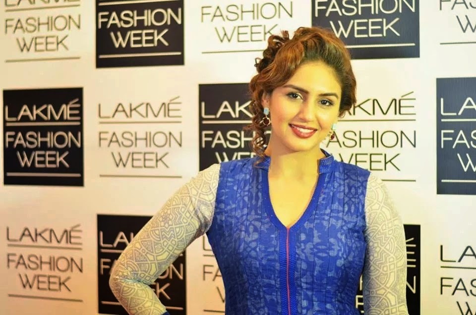 Celebrity guest posing for media wall portraits at Lakmé Fashion Week by Kivashe